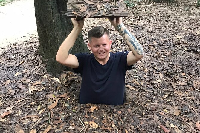 6 Hours Historical Tour in Cu Chi Tunnel with Free Snack - Arriving at the tunnels: documentary first, then the real stuff