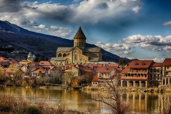 Ancient Georgia Group Tour: Mtskheta,Jvari, Gori, Uplistsikhe - Uplistsikhe cave town: climbing the rocky bank and choosing good shoes