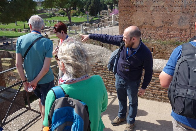 Ancient Ostia Antica Semi-Private Day Trip from Rome by Train with Guide - Baths of Neptune and the Mosaics: Art With a Job