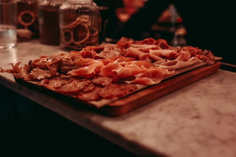 Barcelona: Tipsy Tapas & History Tour in the Gothic Quarter - Stop 3 guided Gothic Quarter walk: the stories behind the stones