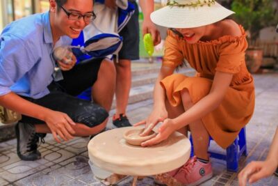 Bat Trang Pottery ancient village by Motorbike - The ceramic workshop: making something with a traditional family