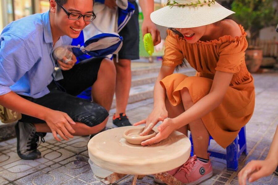 Bat Trang Pottery ancient village by Motorbike - The ceramic workshop: making something with a traditional family