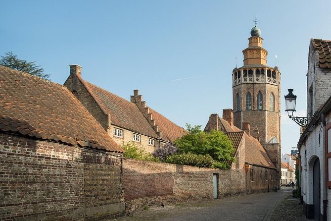 Bruges Food and History Tour: Culinary Delights & Hidden Gems - Dijver Walk to Onze-Lieve-Vrouwekerk and Gruuthusemuseum