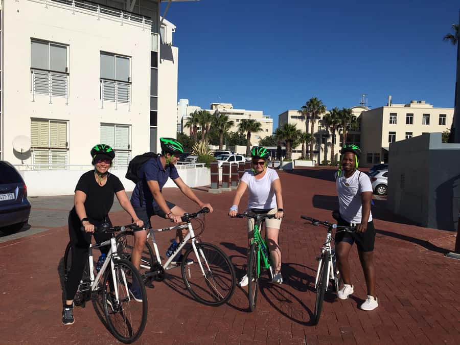 Cape Town Guided City Cycling Heritage Tour - Private Tour - Sea Point Promenade: Robben Island in the distance, easy riding up front