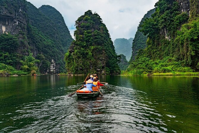 Discover Trang An Natural World Heritage, Bich Dong Pagoda, Cycling Day Tour - Trang An Grottoes by small boat: the main event