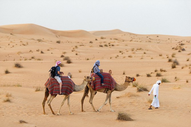 Dubai Camel Desert Safari, Traditional Meal & Heritage Activities - Camel caravan instead of dune-bashing