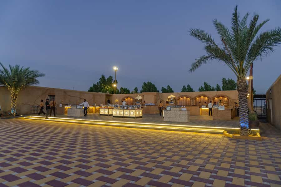 Dubai: Desert Safari or Hatta Tour with Kayaking - The Traditional Desert Camp: BBQ, Henna, And Live Performances
