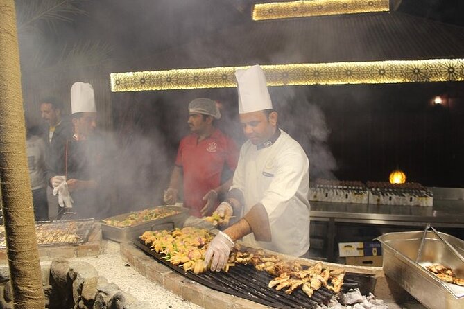 Dubai Evening Desert Safari With BBQ Dinner at Arabian Heritage - Live entertainment at night: Tanoura, fire show, and belly dance