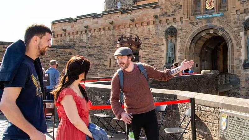 Edinburgh: Edinburgh Castle Guided History Tour with Tickets - Royal Mile meet-up: green umbrellas by Adam Smith