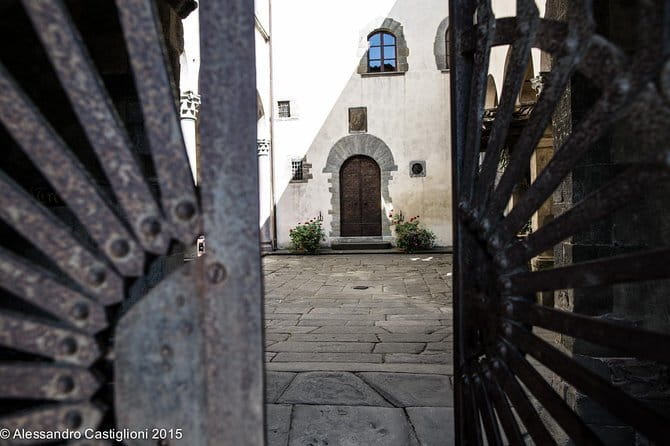 EXCLUSIVE - Wine Tasting near Florence with Castle and Ancient Cellars Tour - Descending into ancient cellars for the four-wine tasting flight