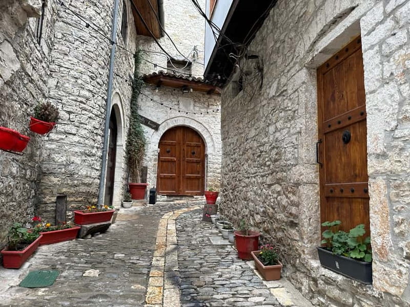 From Tirana: Berat UNESCO Heritage & Belshi Lake Tour - Entering Berat Castle on stone streets people still call home