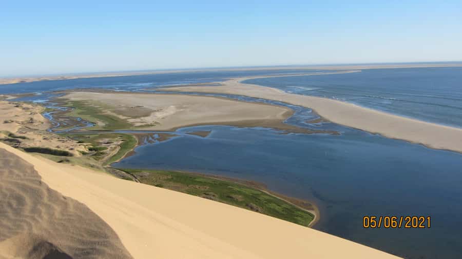 From Walvis Bay: Sandwich Harbour World Heritage Site - Walvis Bay’s flamingos set the tone for Sandwich Harbour
