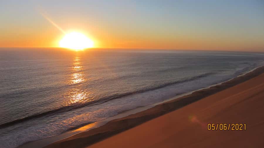 From Walvis Bay: Sandwich Harbour World Heritage Site - Sandwich Harbour Lagoon: UNESCO coastal wetlands between sea and dunes