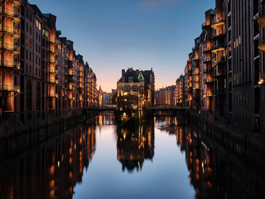 Guided tour of Hamburg's UNESCO World Heritage Site - Warehouses & Cathedrals of Commerce - Wasserschloss in Speicherstadt: dockworkers, not just warehouses
