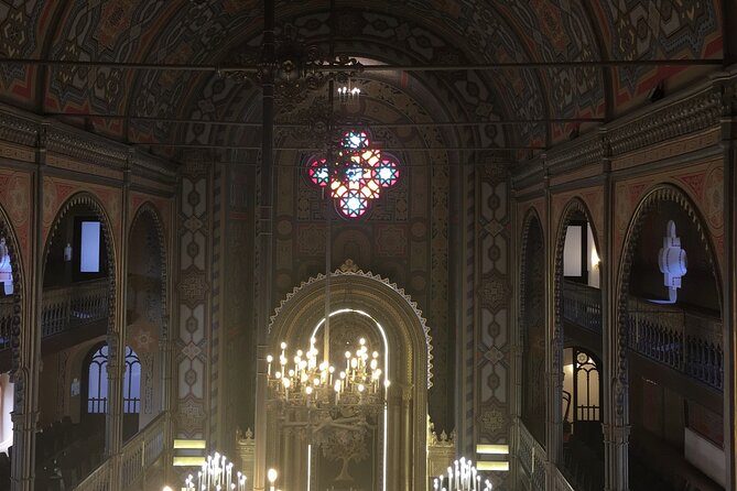 Half-Day Jewish Heritage Walking Tour in Bucharest - Stop 1: Great Synagogue—Rococo paint, Iron Guard damage, and repeated rebuilding