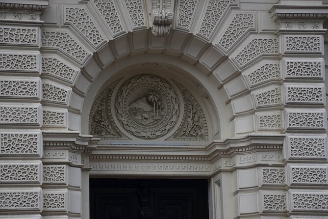 Heritage Dunedin City Walking Guided Tour - Broadway Medical Centre: where a shoe shop and tragedy left a mark