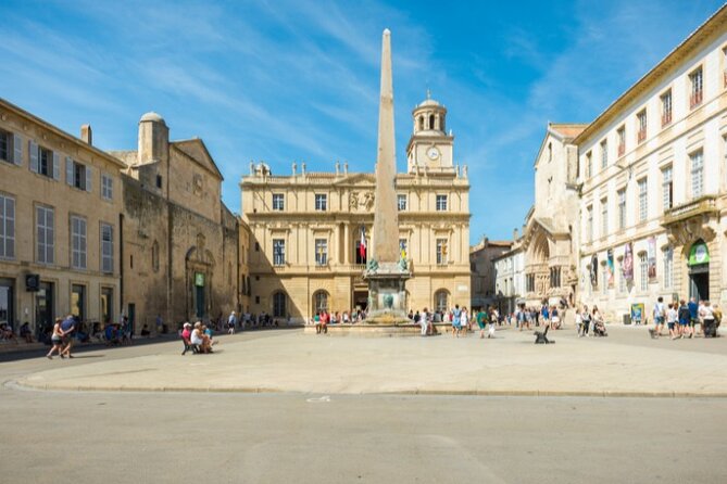 Historical Walking Tour of Ancient Arles with an APP - Rue Voltaire: Cobblestones, Shops, and a Short Provençal Pause
