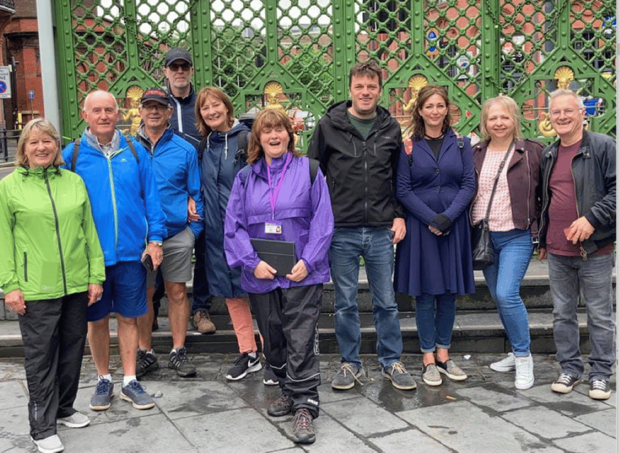 Liverpool: Heritage, History & Culture Guided Walking Tour - Early city-center stops: Derby Square, Liverpool Castle, and street-level history