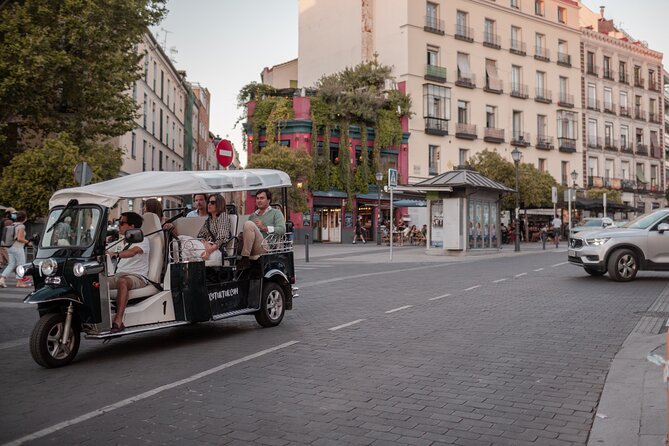 Madrid Historical Tour with Local Guide in Eco Tuk Tuk Private - Getting on the Eco Tuk-Tuk: meeting at Puerta del Príncipe