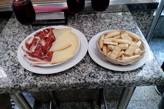 Madrid Tapas & Drinks: A Small Group Culinary Adventure - Tablao Flamenco Arco de Cuchilleros Area: Tapas With Medieval-Madrid Flavor