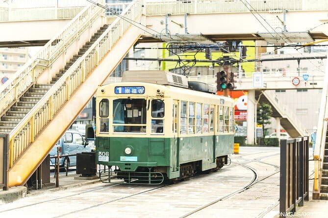 Nagasaki Private Historical Tour with Licensed Guide - Urakami Cathedral and the Peace Park stops: survival and a vow