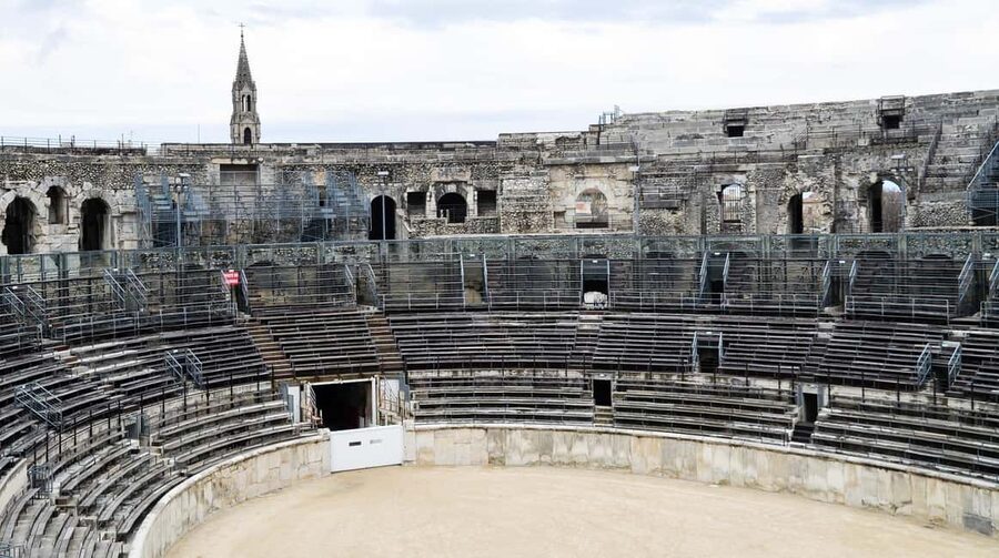 Nimes: Ancient Roman Arena Ticket & Old Town Audio Tour - Nîmes Arena: What You Really Get From the Roman Amphitheatre Ticket