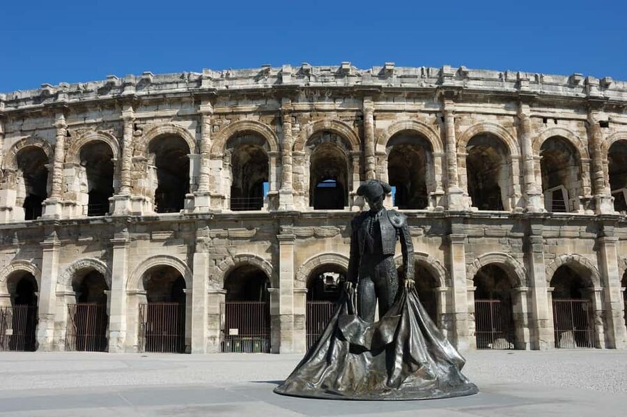 Nimes: Ancient Roman Arena Ticket & Old Town Audio Tour - Old Town Audio: How the App Connects Nîmes Monuments