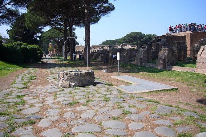 Private tour of Ostia, the ancient city harbor, by van with a PhD archaeologist - Walking the Decumanus: Warehouses, Streets, and Built-In Clues