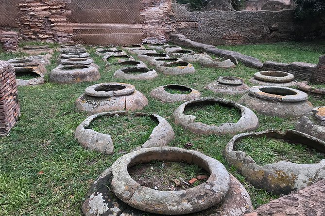 Private tour of Ostia, the ancient city harbor, by van with a PhD archaeologist - Theater, Squares, and Trade Associations: Where Community Shows Up