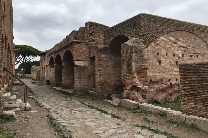 Private tour of Ostia, the ancient city harbor, by van with a PhD archaeologist - From Your Hotel to the Archaeological Park: Van Pickup Done Right