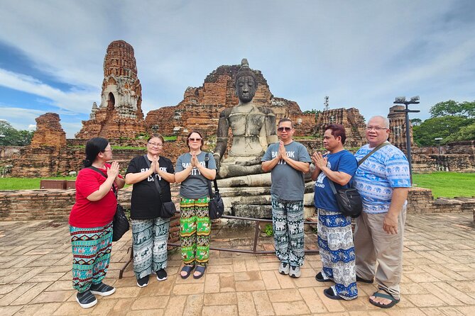 Private Tour to Ayutthaya, World Heritage Site with Boat Tour - Wat Mahathat: the Buddha head in Bodhi roots