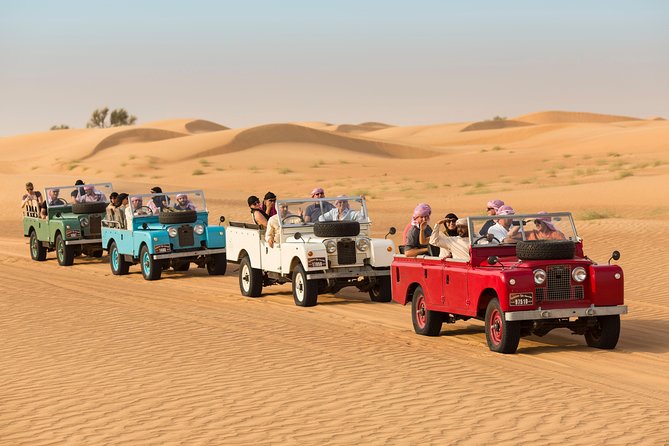 Private Vintage Land Rover Heritage Desert Safari- 4 Course Dinner & Activities - Emirati entertainment: drumming, Yola, and music