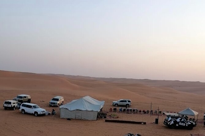 Red Sand Dunes Tour with Camel Ride ,Quad Biking, Heritage House - Sunset and campfire dinner: the part you’ll remember