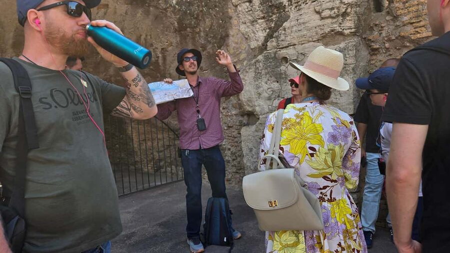 Rome: Colosseum and Ancient Rome Guided Walking Tour - The guide experience: headsets, humor, and myth-busting