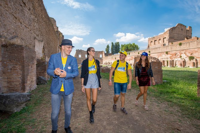 Rome: Colosseum Arena, Roman Forum & Palatine Hill Tour - Practical tips for timing, heat, and your feet