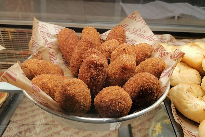 Rome: Trastevere street food and history tour - small group - Santa Maria in Trastevere: square energy and an inside look