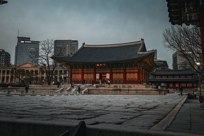 Seoul History Tour: Dark Past & Market Street Flavors - Deoksugung Palace: traditional royal space meets Western modernization