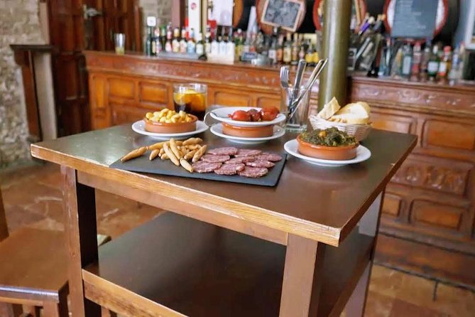 Sevilla Food Tour: Tapas, Wine, History & Traditions - Barrio Santa Cruz finale: albóndigas, pestiños, and PX sherry
