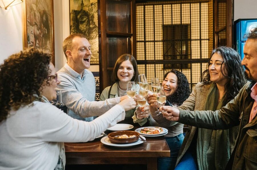 Seville: Private Tapas & History Tour in Triana Neighborhood - The Aperitif Stop: Vermouth, Cold Tapas, and Local Etiquette