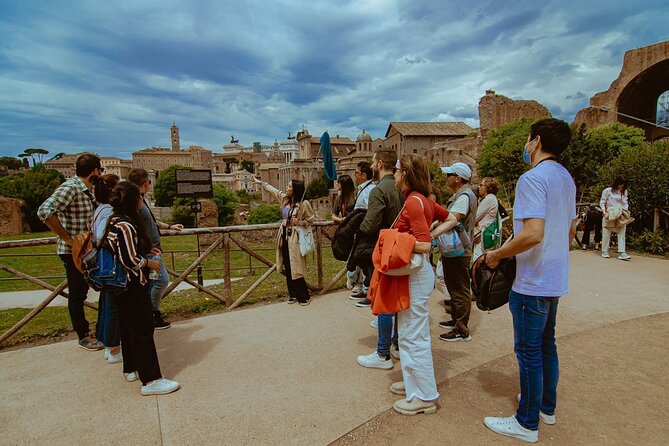 Small group Colosseum with Arena Floor, Palatine Hill & Forum Tour - Down to the valley: Via Sacra stops that make the Forum feel real