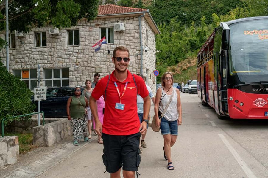 Split: Historical Tour of Salona, Klis Fortress and Trogir - Meeting the crew: find the red open-top bus