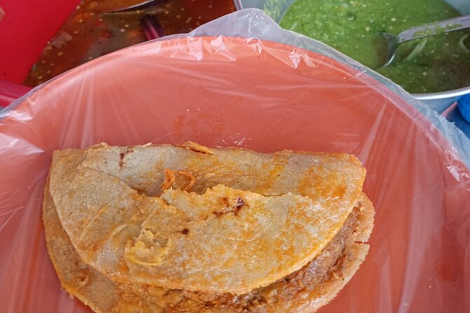 Taco and History Tour in the All Inclusive Historic Center - Stop 6 to finish at Coox Hanal: cochinita pibil and horchata