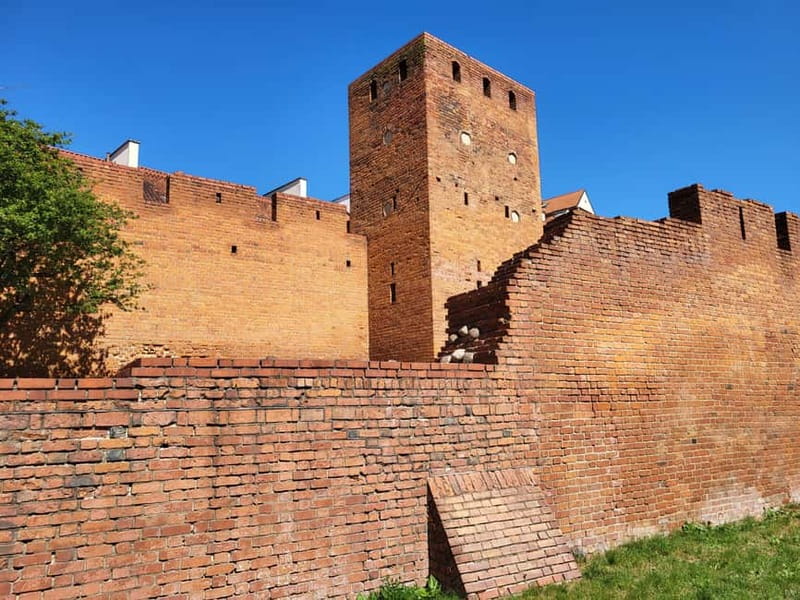 Warsaw Old Town UNESCO HERITAGE walking tour in English - Warsaw Barbican and City Walls: Defense, Planning, and Survival