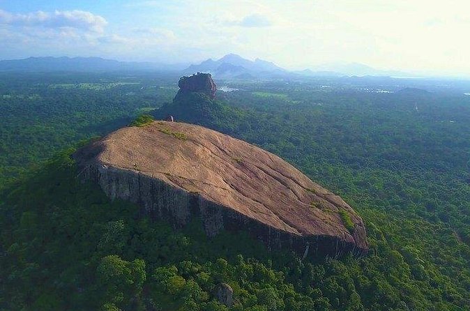 World Heritage Sigiriya and Dambulla Day Tour - Dambulla Cave Temple: how to enjoy 160 meters of drama