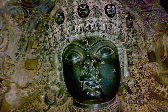 World heritage site of Belur & Halebid with temple sculptures - The Nandi statue at Halebid: the long build and the lifelike face